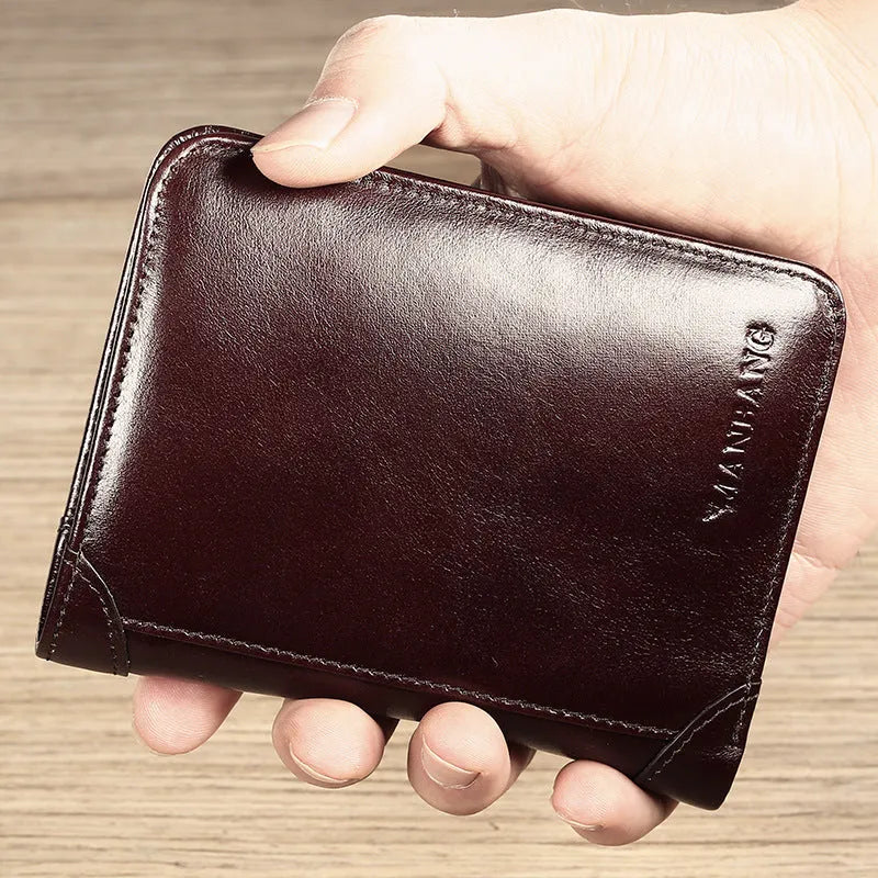 Men's leather wallet showing multiple compartments including banknote folder and card slots