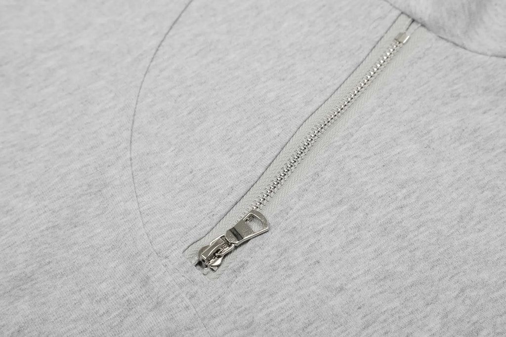 Men's loose fit black and grey cotton long sleeve casual T-shirt on a hanger.