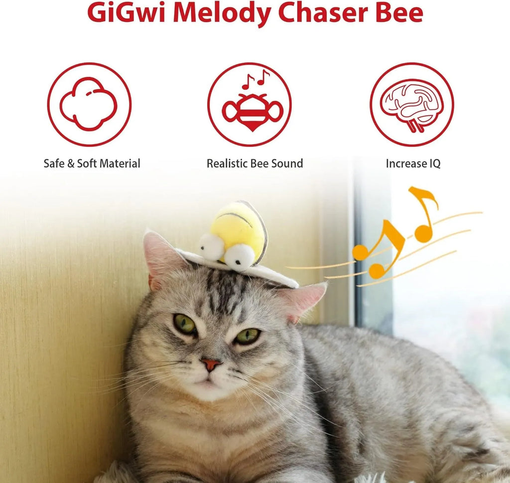 Yellow bee-shaped electronic cat toy with flannelette fabric on wooden surface