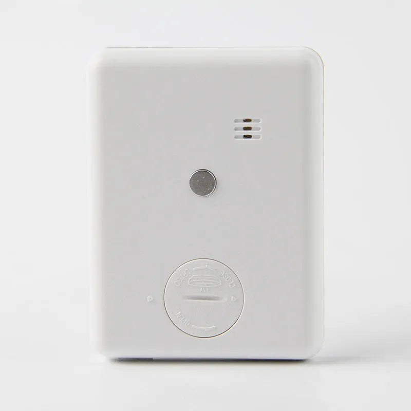 Digital kitchen timer with magnetic back and LCD display showing countdown time