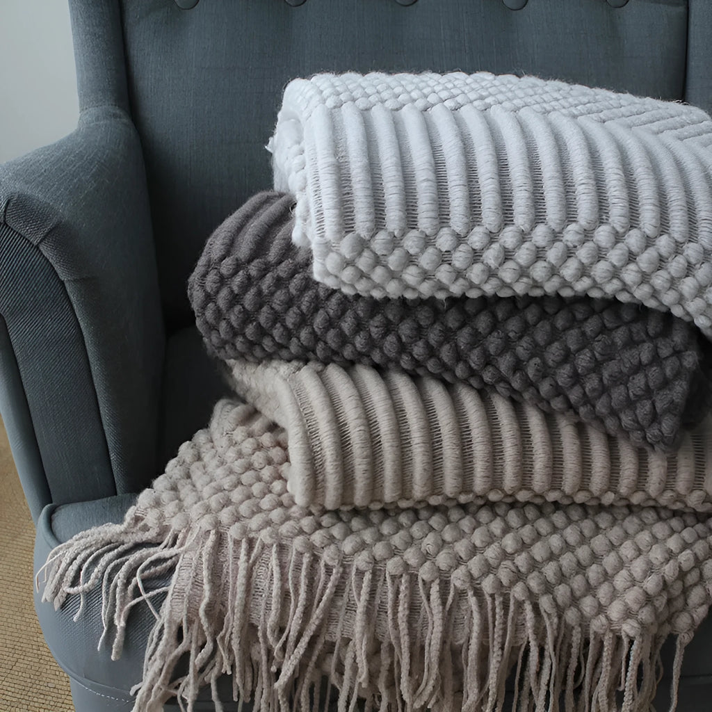 Small 127cm by 170cm polyester nap blanket shown in dark grey, khaki, and light grey colour options.