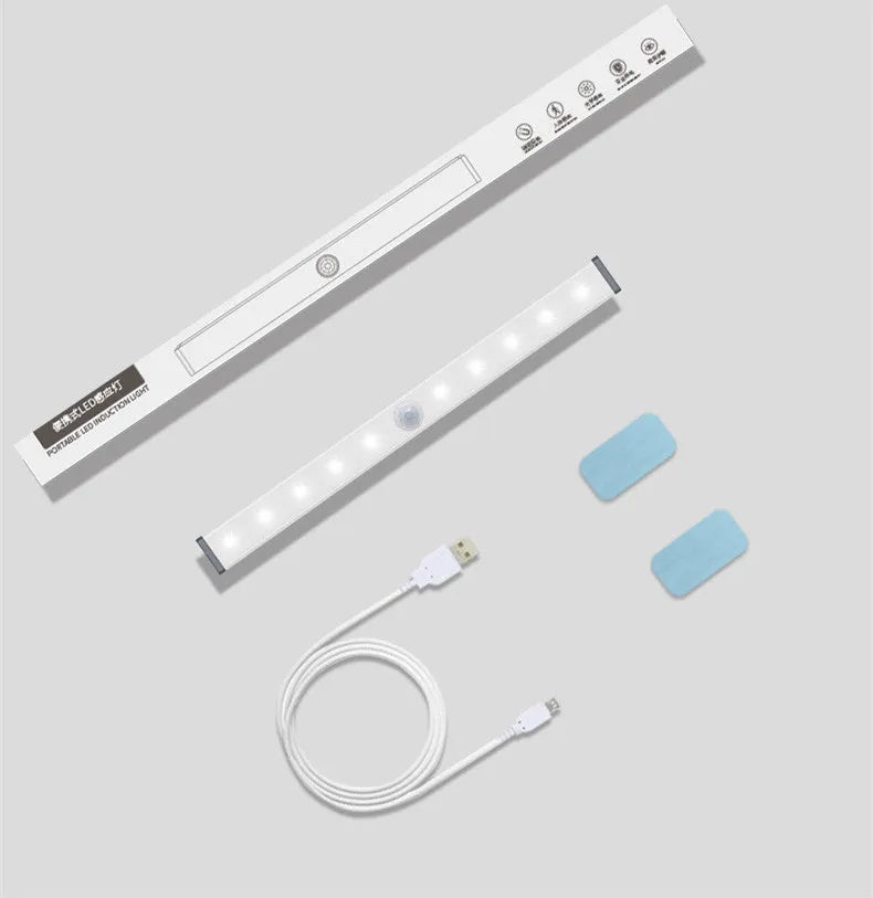 Silver aluminium USB rechargeable LED strip light with magnetic back for wardrobes.