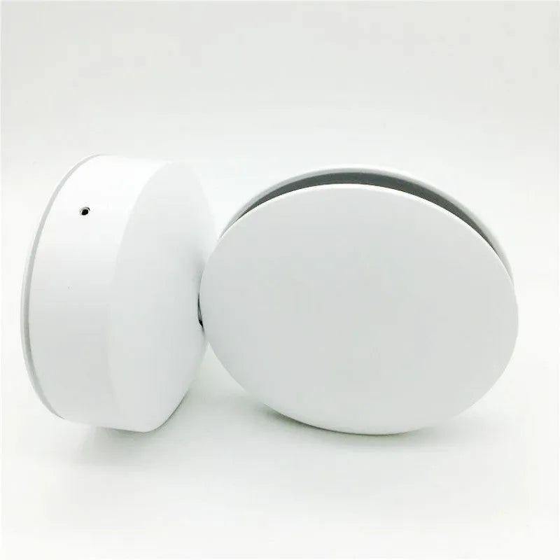 Modern aluminium LED spotlight bar wall lamp with glass lens, shown illuminating a corridor.