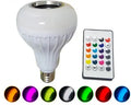White Bluetooth speaker LED light bulb with E27 screw base and remote control.