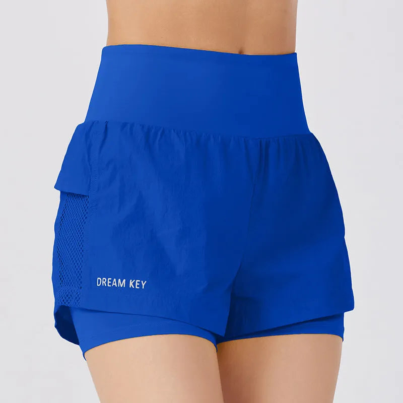Women's loose cotton blend quick-drying sports shorts in lemon yellow colour.