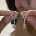 Platinum colour bow-shaped stud earrings with zinc alloy electroplated construction