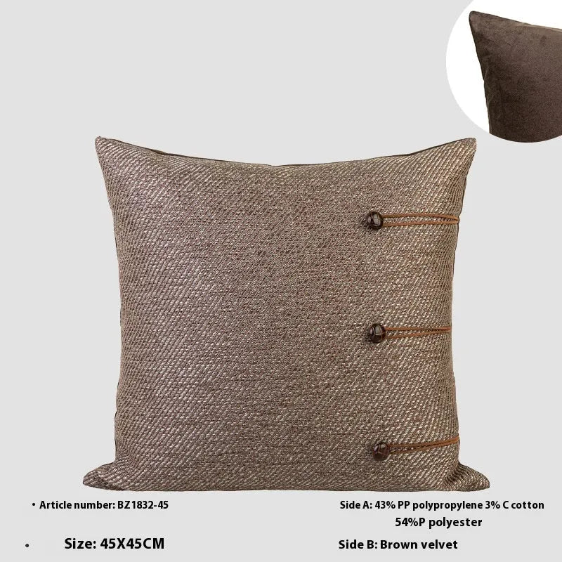 Square Chinese ancient style cushion in brown Maillard colour on a sofa.