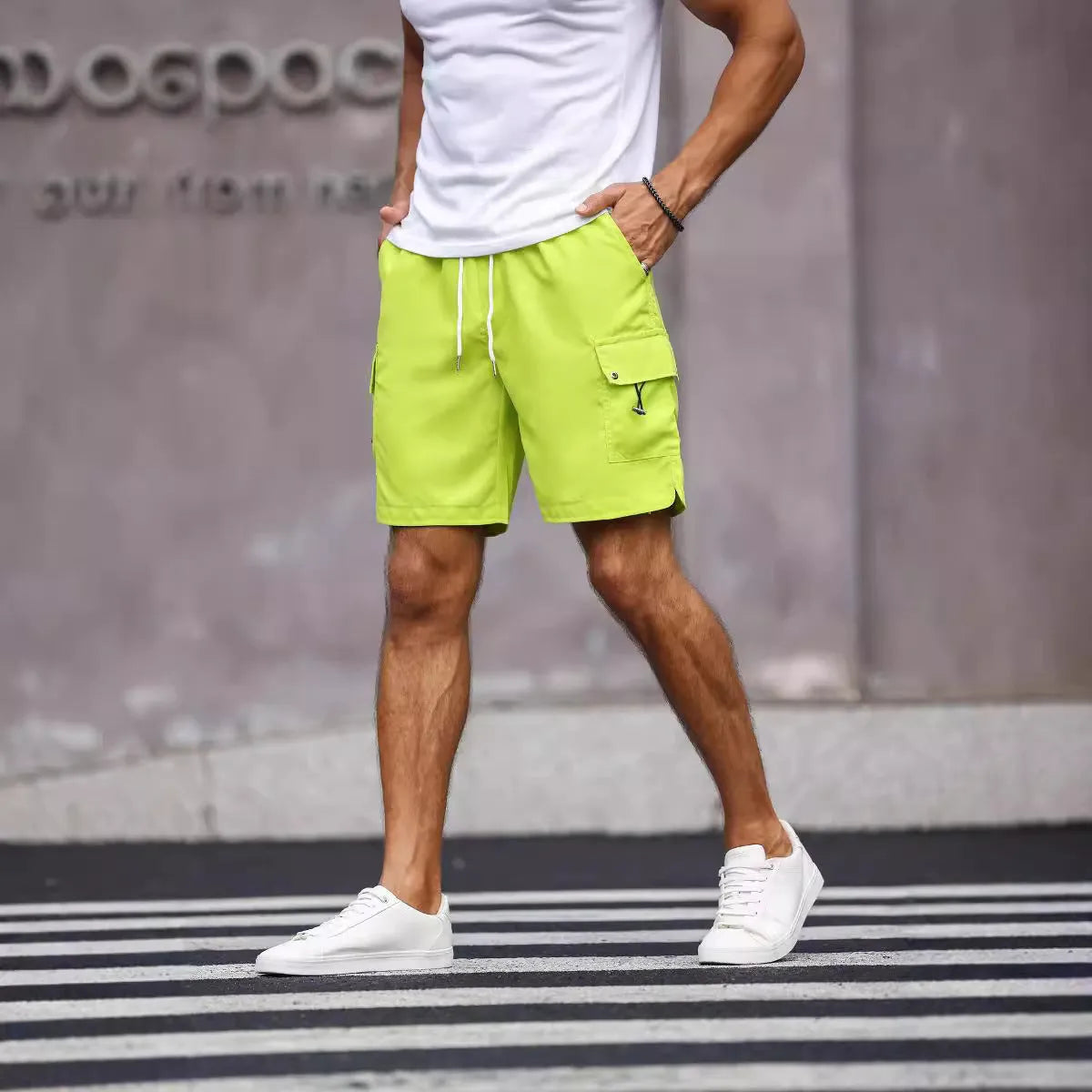 Men's loose fit workwear shorts in army green and fluorescent green colours with straight leg street style design