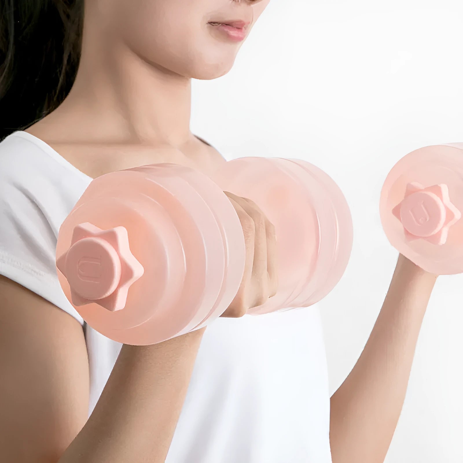Mini portable plastic water dumbbell in transparent pink with water fill, PE construction, 262x97x94cm size for home strength training.