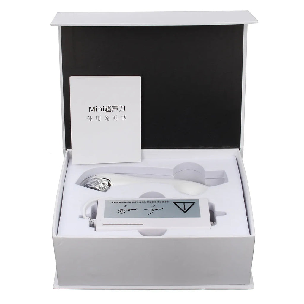 Mini ultrasonic scalpel home portable beauty device for facial firming in purple colour isolated on white background