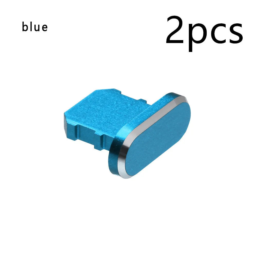 Aluminium alloy iPhone charging port dust plug in metallic colours on a dark background.