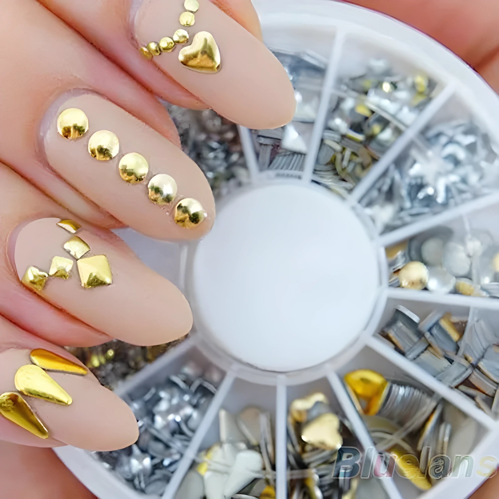 DIY nail art stickers in gold and silver on a white background, acrylic nail decoration set
