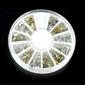DIY nail art stickers in gold and silver on a white background, acrylic nail decoration set