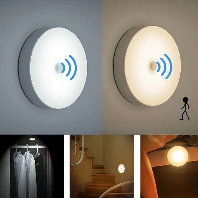 Small round motion sensing night light with USB charging port and adhesive backing