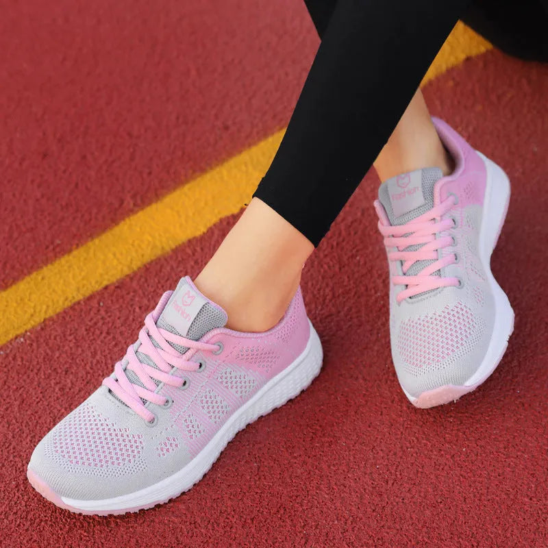 Women's white flat board high-top shoe with cross strap detail and back lacing on artificial PU upper.