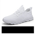 Men's black and white mesh sneakers with lace-up closure and round toe design
