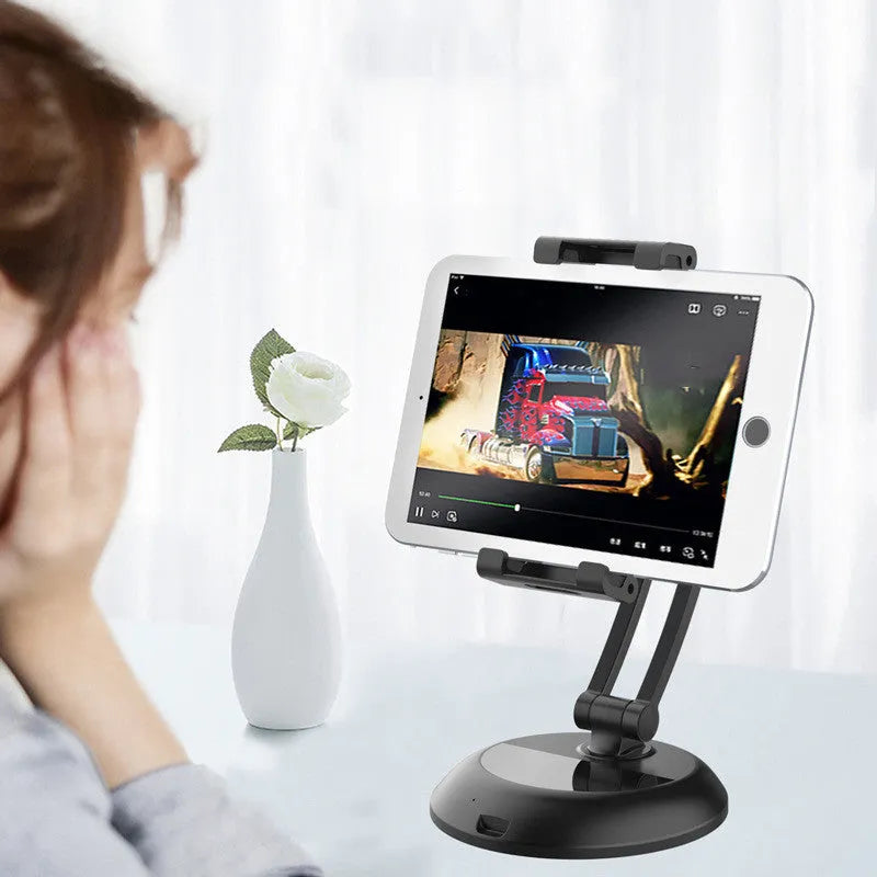Adjustable ABS silicone phone and tablet stand in black on a wooden desktop