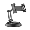 Adjustable ABS silicone phone and tablet stand in black on a wooden desktop