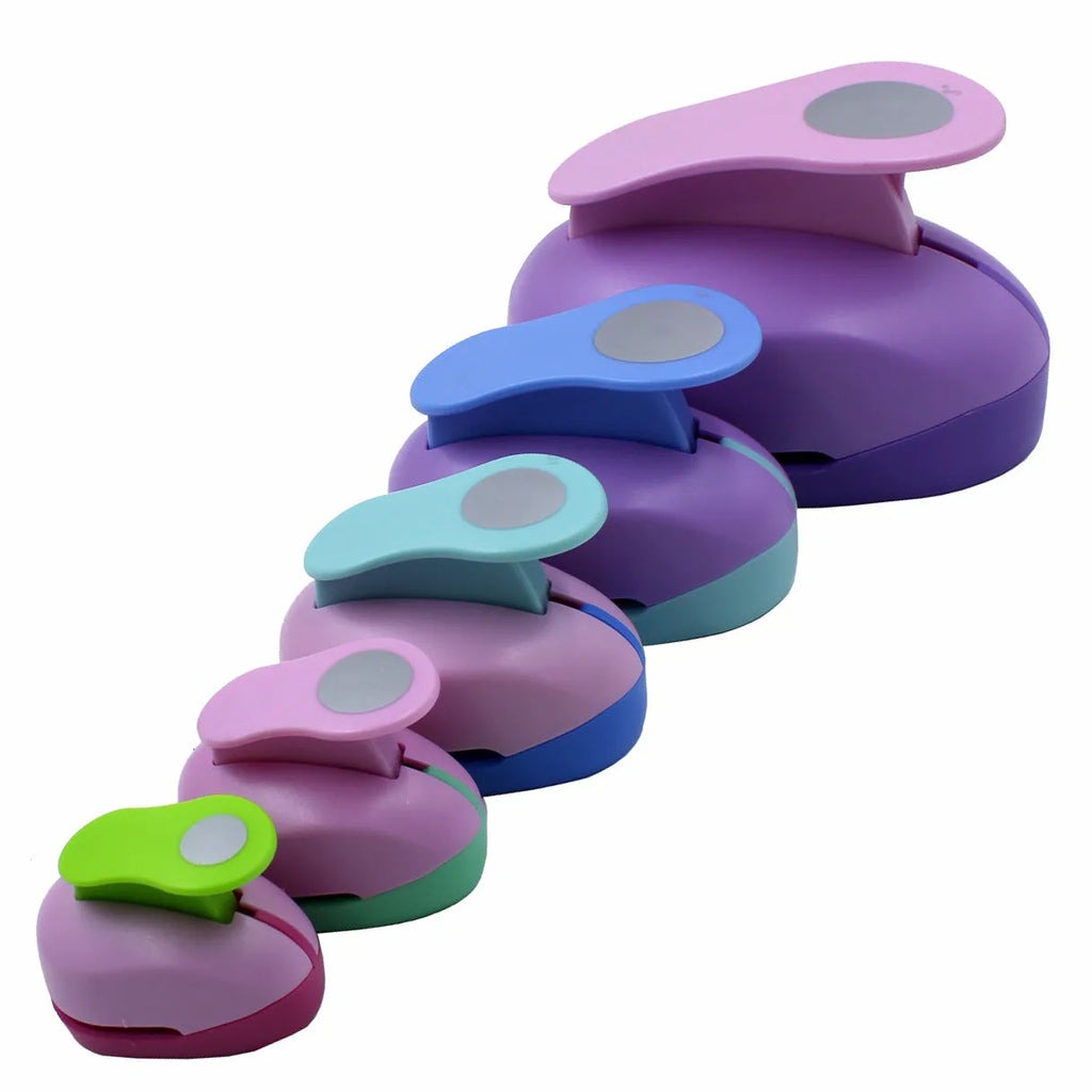 Colourful children's round embossing machine tool with zinc alloy mechanism on a card.