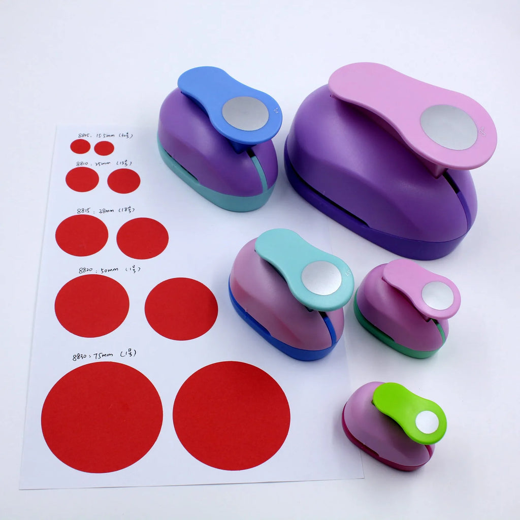Colourful children's round embossing machine tool with zinc alloy mechanism on a card.