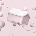 White igloo-shaped ultrasonic humidifier and essential oil diffuser with LED light on a wooden table.