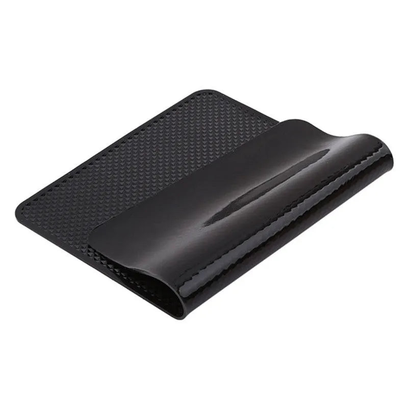 Black small mesh non-slip mat 18x13cm on car dashboard holding mobile phone and coins