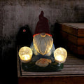 Solar LED resin dwarf doll outdoor ornament statue for garden and courtyard decoration.