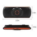 Orange plastic Bluetooth car hands-free device designed for sun visor mounting.
