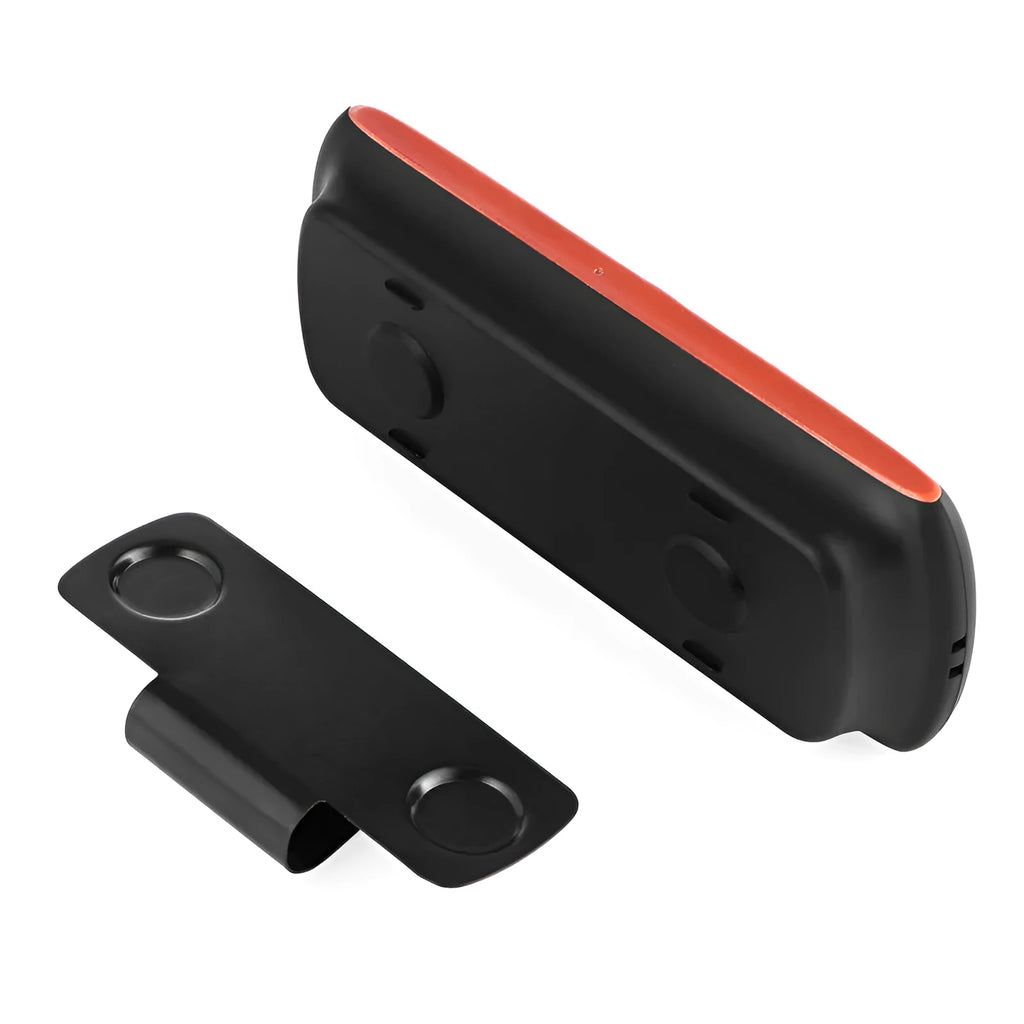 Orange plastic Bluetooth car hands-free device designed for sun visor mounting.