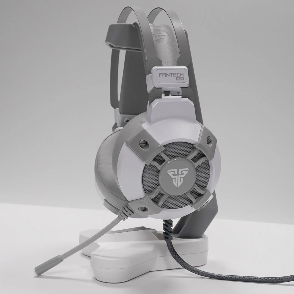 Black Fantech HG11 USB gaming headset with RGB lights on the earcups and an inline remote control on the cable.