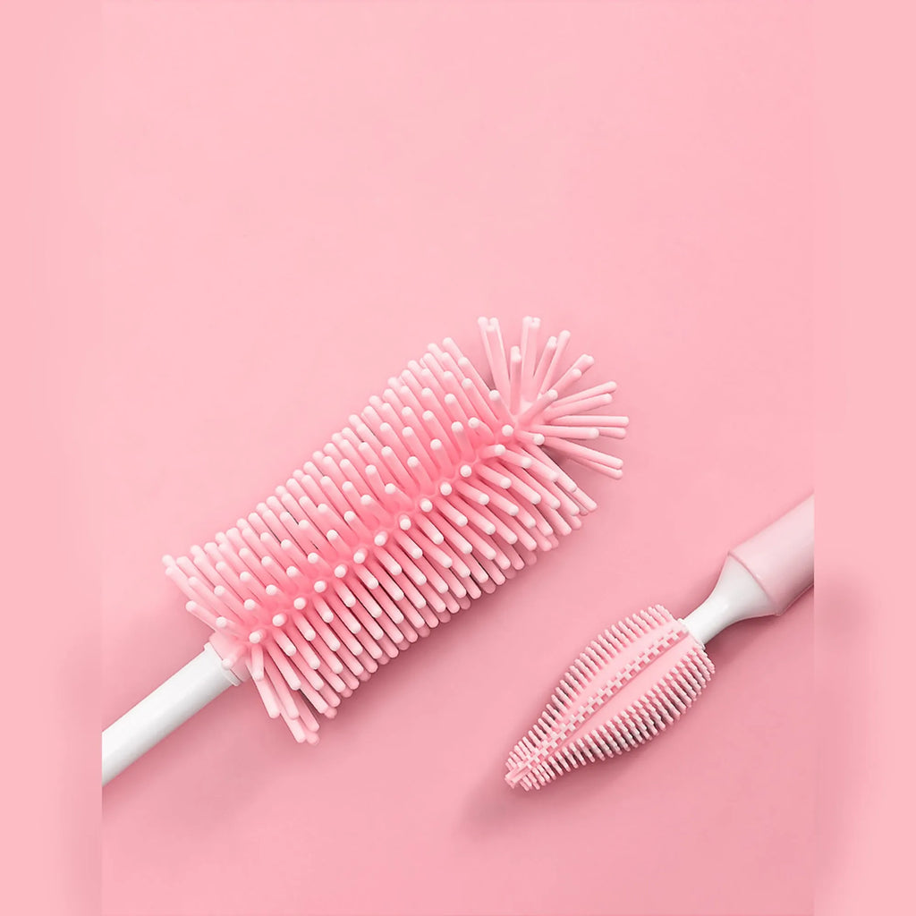 Silicone baby bottle brush set with straw cleaning brush in pink, blue, and yellow