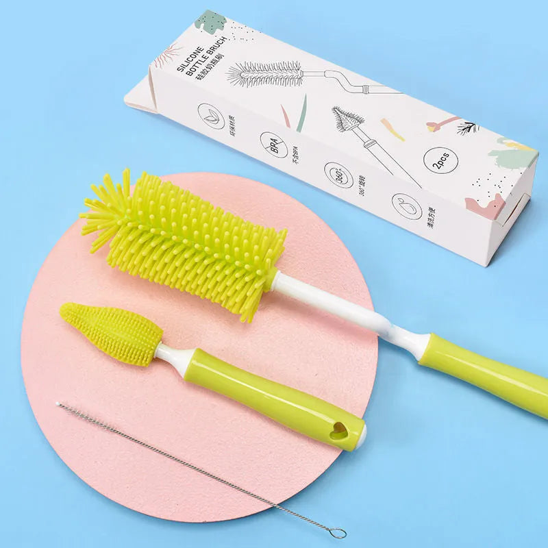 Silicone baby bottle brush set with straw cleaning brush in pink, blue, and yellow