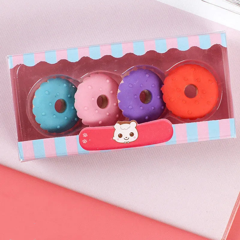 Three sets of cartoon erasers for kindergarten children featuring cones, ice creams, donuts and lollipops