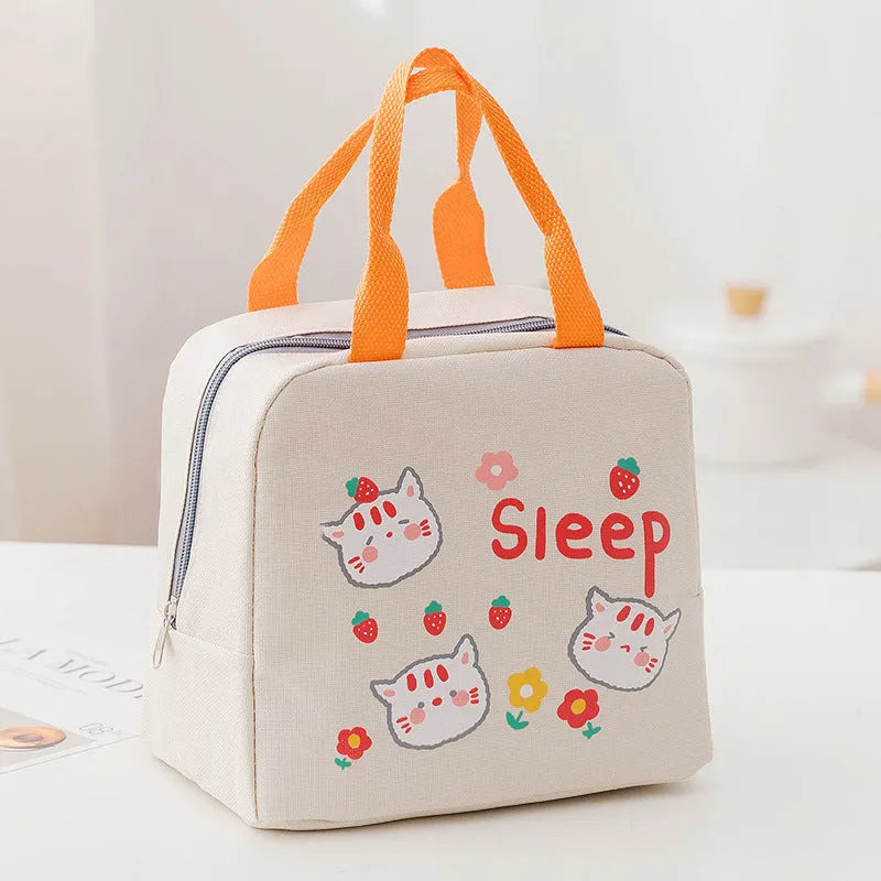 Insulated lunch bag with thermal lining showing character designs including grey unicorn and navy blue planet cat patterns