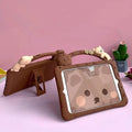 Brown cartoon pattern silicone protective sleeve for iPad tablets on flat surface