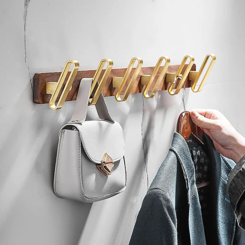 Black walnut aluminium clothes hooks with brass wire drawing treatment in bathroom setting