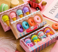 Three sets of cartoon erasers for kindergarten children featuring cones, ice creams, donuts and lollipops