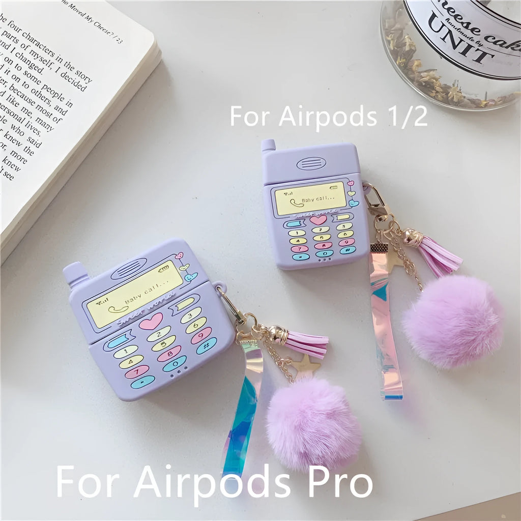 Purple silicone clamshell case for Apple AirPods Pro and AirPods 1 2 with a white fur ball pendant.