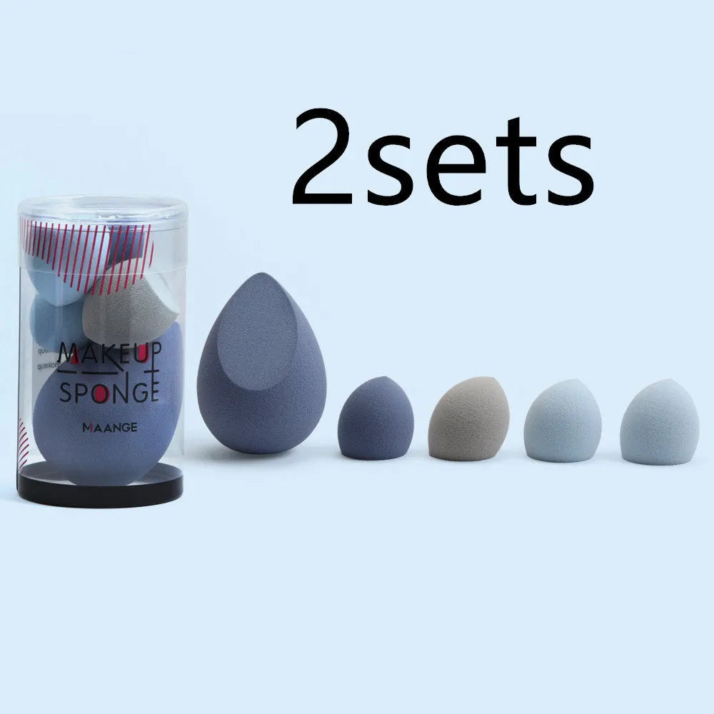 Five mini beauty eggs cosmetic sponges in blue pink and purple with flocking velour surface