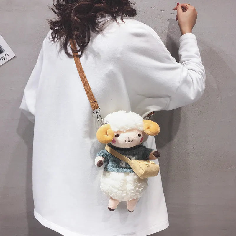 Little Sheep plush crossbody bag with lamb pattern, square shape and zipper opening in blue colour