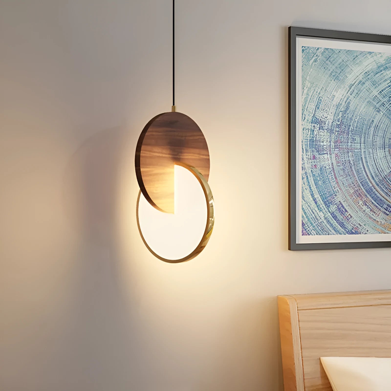 Long-line modern chandelier made from carved solid walnut wood, mounted on a wall.