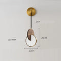 Long-line modern chandelier made from carved solid walnut wood, mounted on a wall.