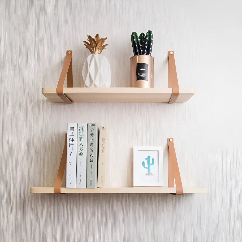 Pine wood wall-mounted storage shelf in Nordic style, 50cm wide by 16cm deep, holding books and remote controls.