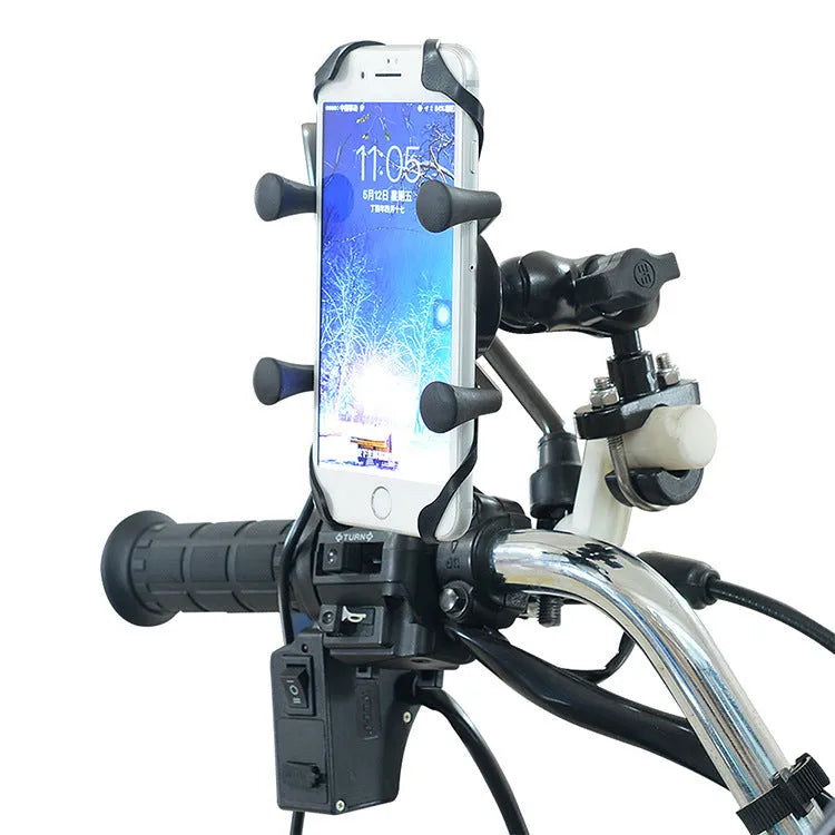 Black aluminium motorcycle phone bracket mounted on handlebar holding smartphone