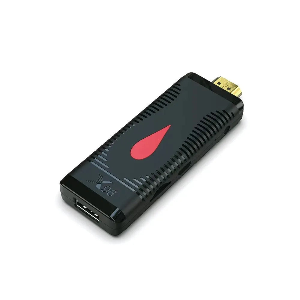 Android TV set-top box streaming device in mini TV stick dongle format with infrared remote control