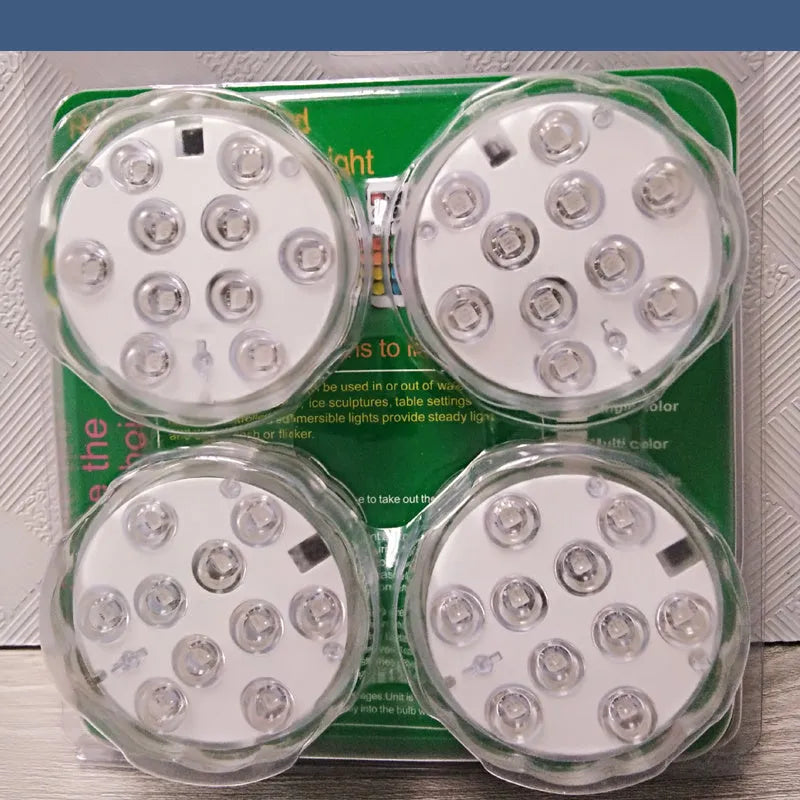 White waterproof disc LED light with remote control for swimming pools and garden decoration.