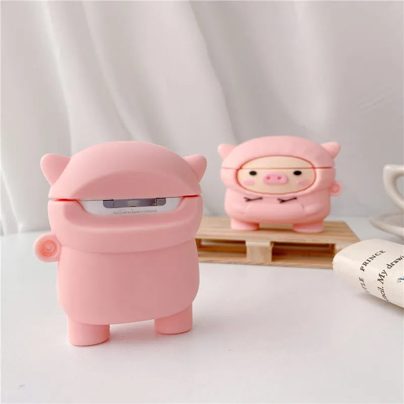Pink silicone AirPods case cover with cartoon pig design and a metal hook attached