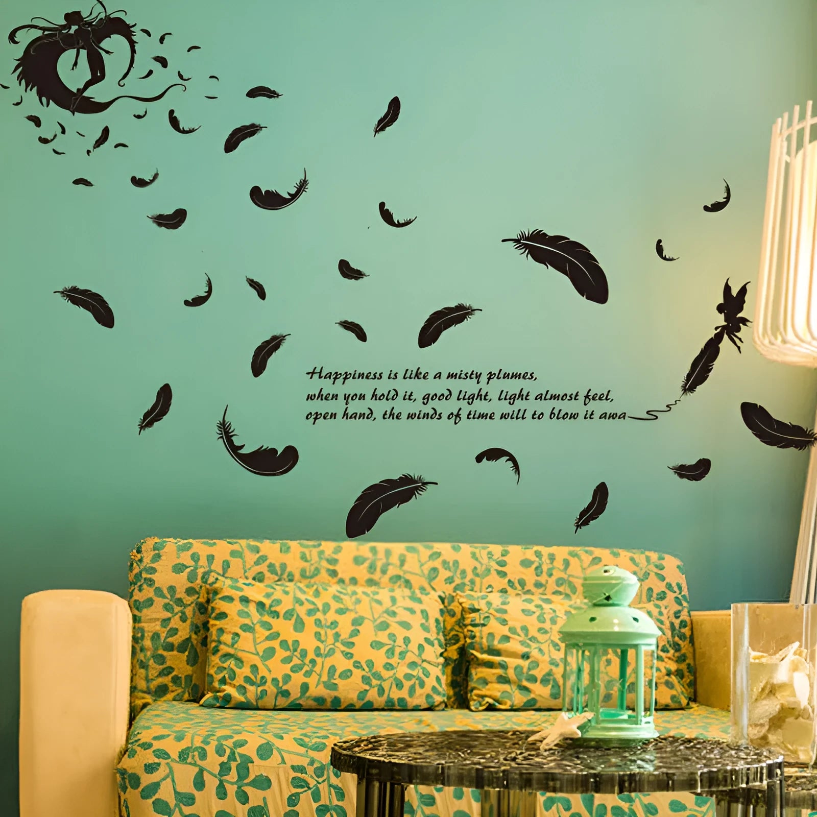 Black feather angel three generations removable wall sticker on a white wall.
