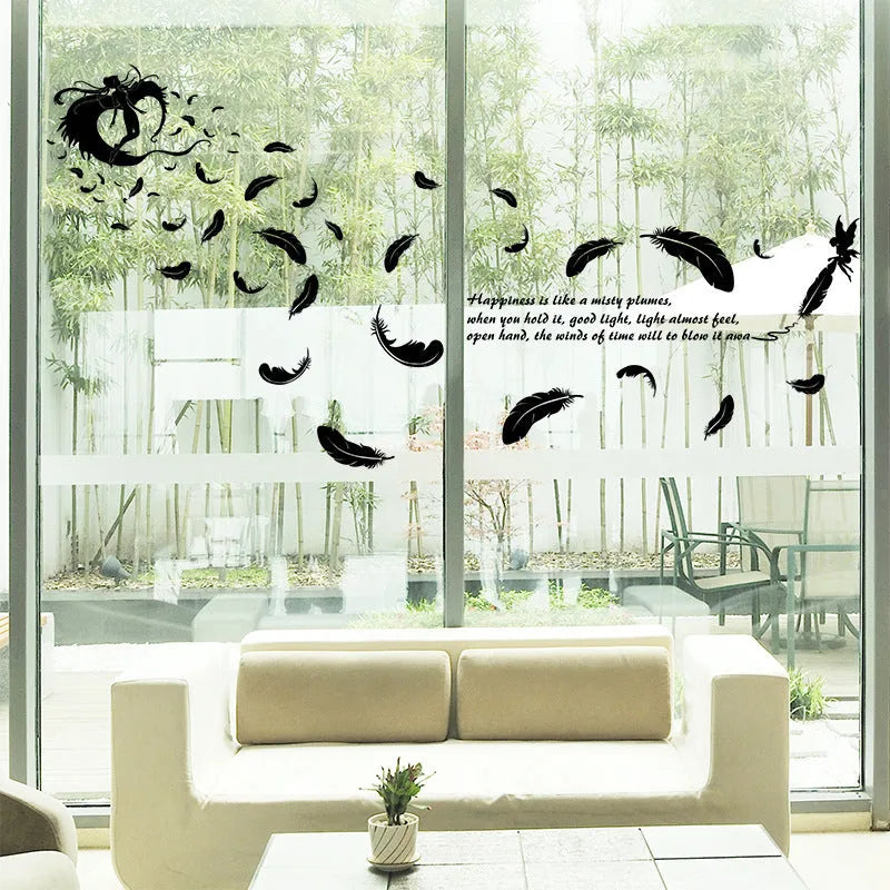 Black feather angel three generations removable wall sticker on a white wall.