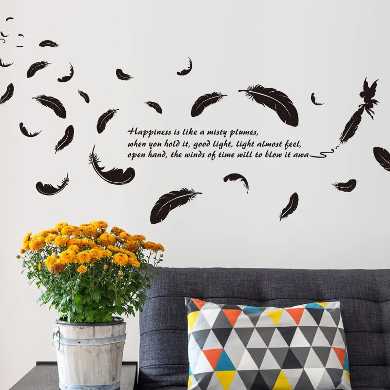 Black feather angel three generations removable wall sticker on a white wall.